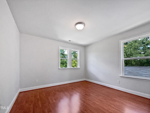 148 Daneborg Rd, Durham, NC 27703 - unfurnished room featuring wood finished floors and baseboards