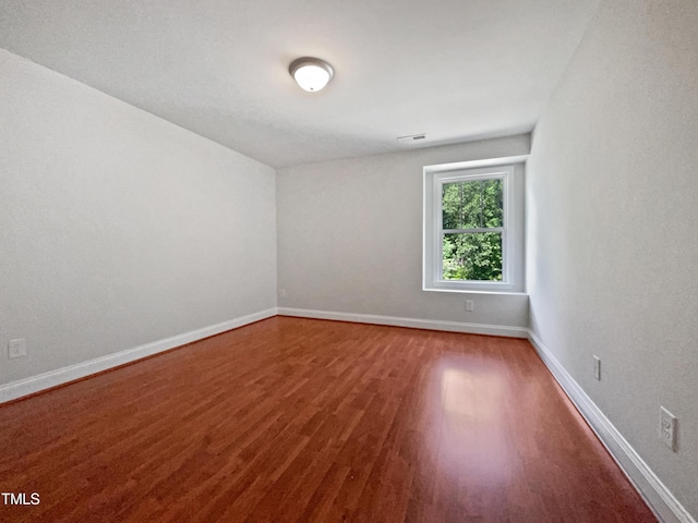 148 Daneborg Rd, Durham, NC 27703 - spare room with wood finished floors and baseboards