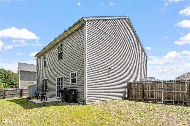 228 Botanical Ct, Bunnlevel, NC 28323 - rear view of house with a patio