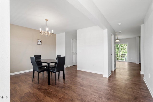 228 Botanical Ct, Bunnlevel, NC 28323 - dining space with a chandelier, dark wood-style flooring, and baseboards