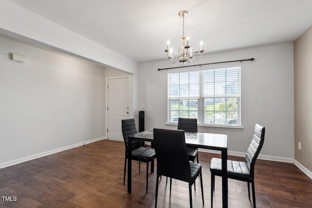 228 Botanical Ct, Bunnlevel, NC 28323 - dining space with a chandelier, wood finished floors, and baseboards