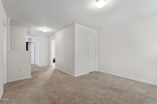 228 Botanical Ct, Bunnlevel, NC 28323 - carpeted empty room with baseboards and attic access