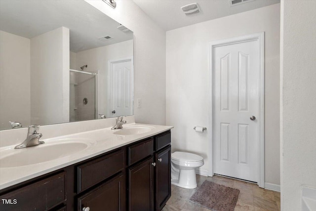 228 Botanical Ct, Bunnlevel, NC 28323 - bathroom with a shower stall, double vanity, toilet, and baseboards