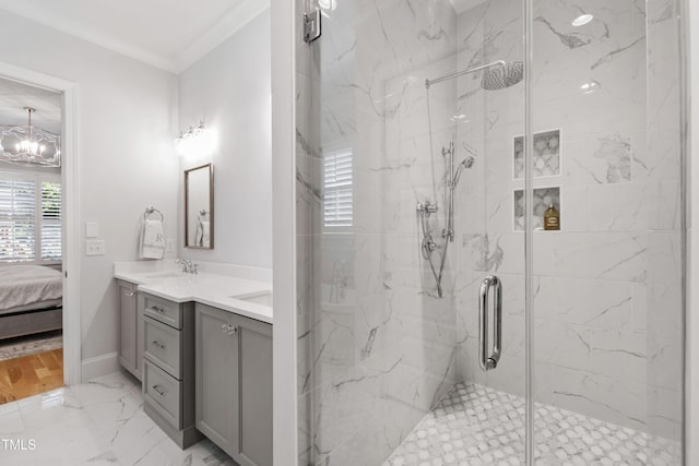 911 Canterbury Rd, Raleigh, NC 27607 - full bathroom with a marble finish shower, double vanity, crown molding, ensuite bathroom, and a chandelier
