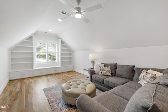 911 Canterbury Rd, Raleigh, NC 27607 - living area with built in features, baseboards, light wood-type flooring, lofted ceiling, and a ceiling fan
