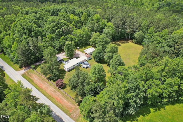 8089 Crawford Currin Rd, Oxford, NC 27565 - aerial overview of property's location with a heavily wooded area