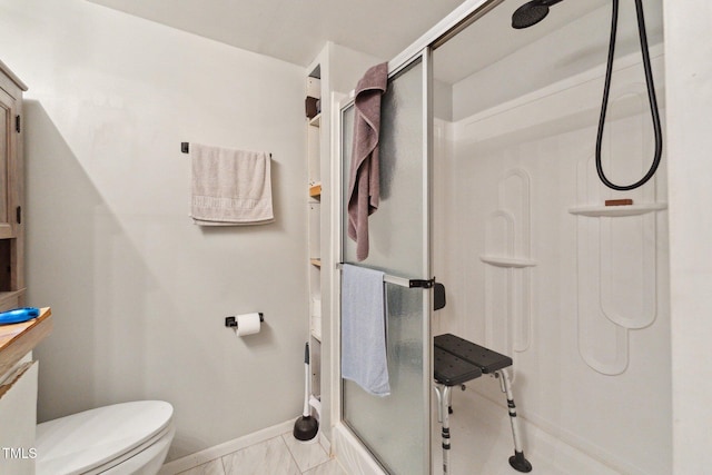 8089 Crawford Currin Rd, Oxford, NC 27565 - bathroom featuring a stall shower, toilet, vanity, and baseboards