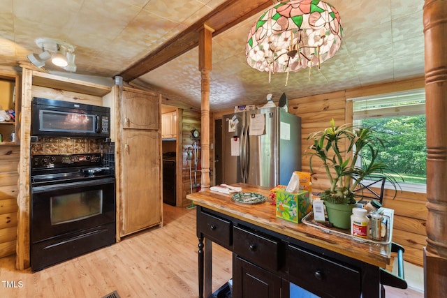 8089 Crawford Currin Rd, Oxford, NC 27565 - kitchen with black appliances, wood counters, lofted ceiling, light wood-style floors, and log walls