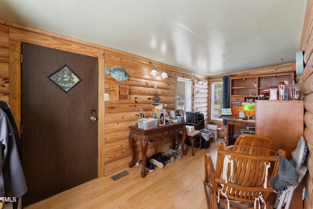 8089 Crawford Currin Rd, Oxford, NC 27565 - office space with rustic walls and light wood finished floors