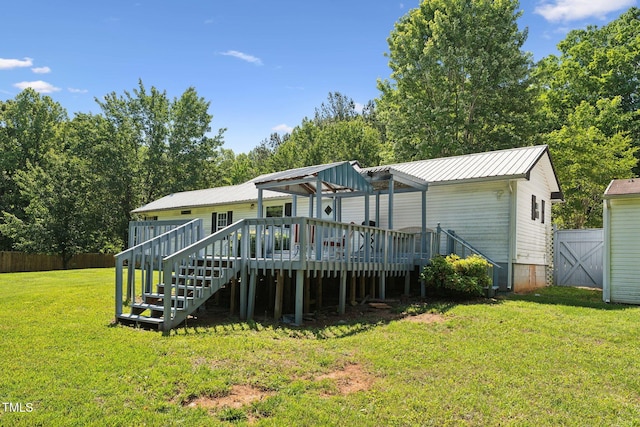8089 Crawford Currin Rd, Oxford, NC 27565 - rear view of property with a deck and metal roof