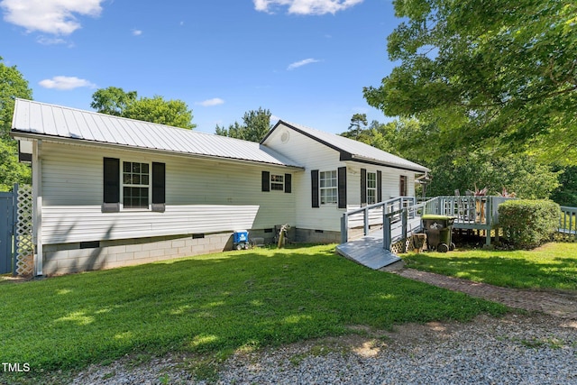 8089 Crawford Currin Rd, Oxford, NC 27565 - view of front of property featuring crawl space, metal roof, and a front yard