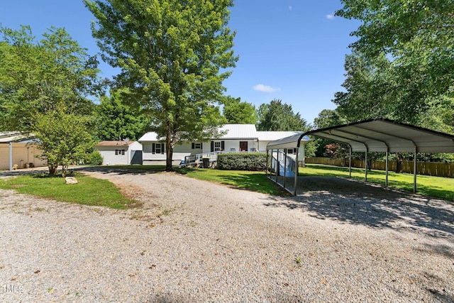 8089 Crawford Currin Rd, Oxford, NC 27565 - view of front of property featuring gravel driveway and a carport