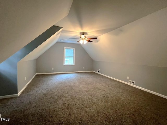 108 W Marsha Gayle Ct, Fuquay Varina, NC 27526 - additional living space featuring ceiling fan, dark colored carpet, baseboards, and vaulted ceiling