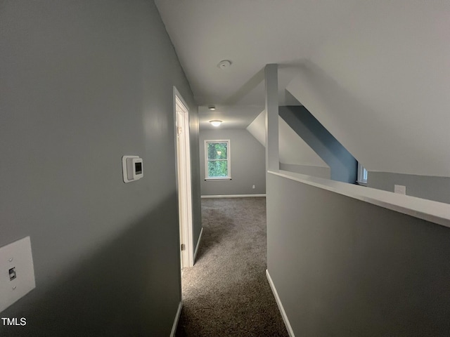 108 W Marsha Gayle Ct, Fuquay Varina, NC 27526 - hall featuring vaulted ceiling, dark carpet, and baseboards