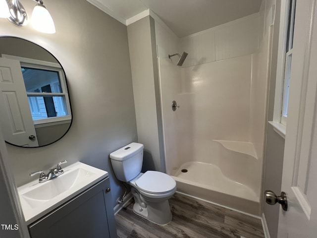108 W Marsha Gayle Ct, Fuquay Varina, NC 27526 - bathroom with wood finished floors, vanity, toilet, ornamental molding, and a shower