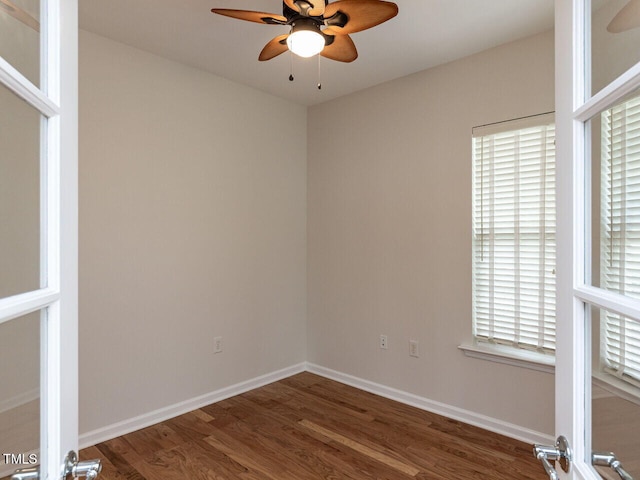 207 Callum Pl, Cary, NC 27519 - empty room with ceiling fan, wood finished floors, and baseboards