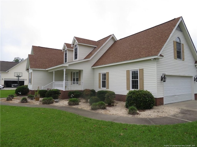 103 Autumn Chase Blvd, Lumberton, NC 28358 - view of property exterior featuring a porch, roof with shingles, a garage, and driveway