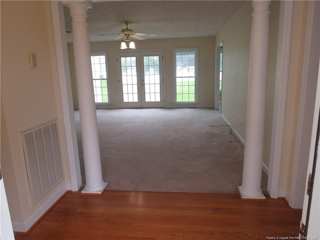 103 Autumn Chase Blvd, Lumberton, NC 28358 - hall featuring carpet flooring, ornate columns, baseboards, and wood finished floors