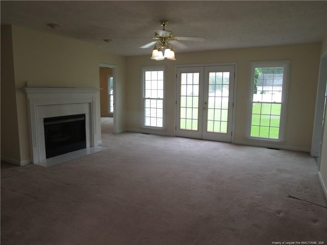 103 Autumn Chase Blvd, Lumberton, NC 28358 - unfurnished living room featuring light colored carpet, plenty of natural light, and baseboards