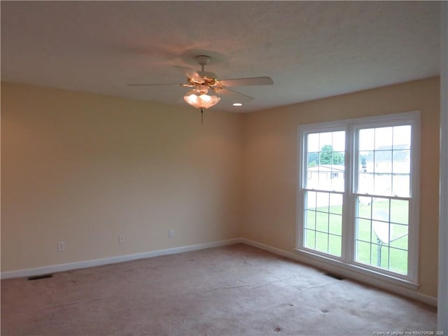 103 Autumn Chase Blvd, Lumberton, NC 28358 - spare room featuring baseboards, light colored carpet, and ceiling fan