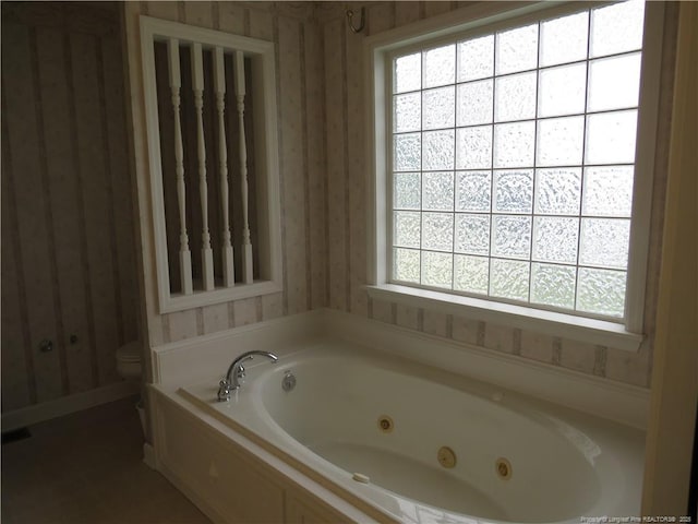 103 Autumn Chase Blvd, Lumberton, NC 28358 - full bathroom featuring wallpapered walls, a tub with jets, and toilet