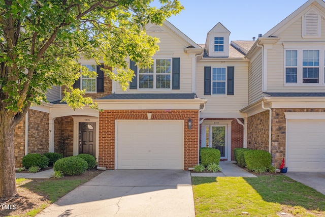 8404 Saltwood Pl, Raleigh, NC 27617 - view of property with an attached garage and concrete driveway