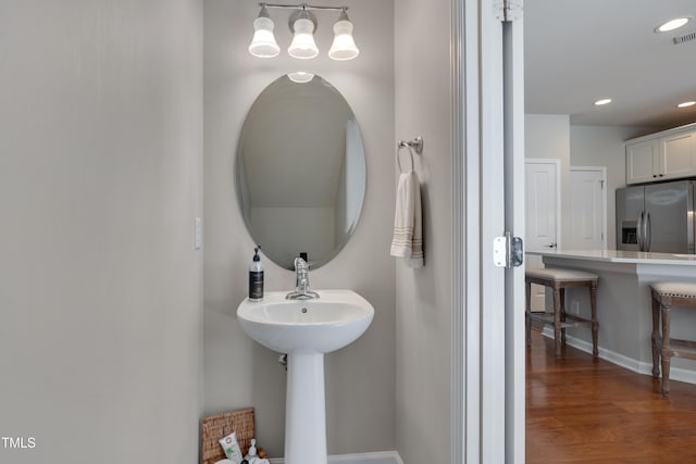 8404 Saltwood Pl, Raleigh, NC 27617 - bathroom featuring wood finished floors and recessed lighting