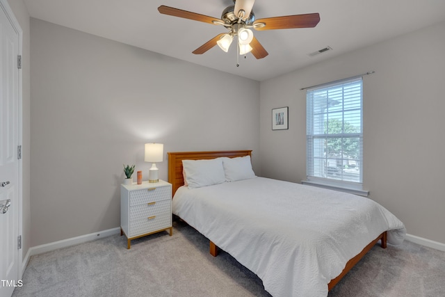 8404 Saltwood Pl, Raleigh, NC 27617 - bedroom featuring carpet, baseboards, and a ceiling fan