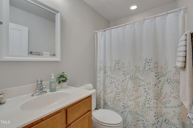 8404 Saltwood Pl, Raleigh, NC 27617 - bathroom featuring vanity, toilet, recessed lighting, and curtained shower