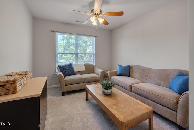 8404 Saltwood Pl, Raleigh, NC 27617 - living room with ceiling fan, light colored carpet, and baseboards