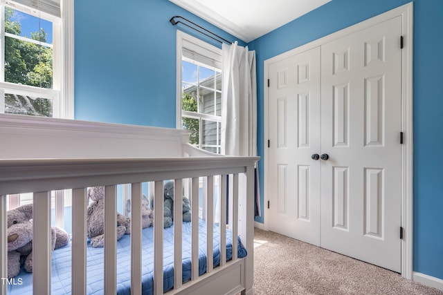 6 Beaver Creek Ln, Durham, NC 27703 - unfurnished bedroom with carpet flooring, a closet, and baseboards