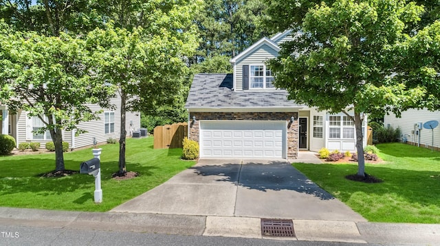 6 Beaver Creek Ln, Durham, NC 27703 - obstructed view of property with driveway, a front yard, and a garage