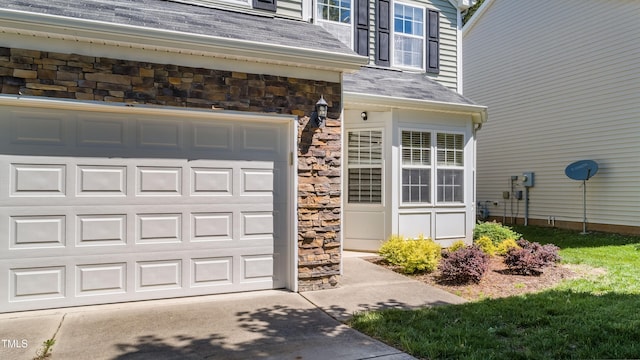 6 Beaver Creek Ln, Durham, NC 27703 - garage with concrete driveway