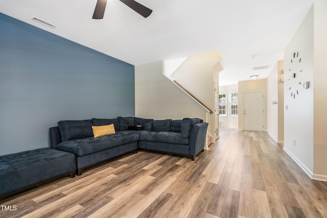 6 Beaver Creek Ln, Durham, NC 27703 - living area featuring a ceiling fan, wood finished floors, and baseboards