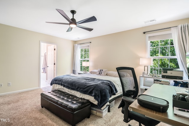 6 Beaver Creek Ln, Durham, NC 27703 - carpeted bedroom featuring ceiling fan, baseboards, and ensuite bath