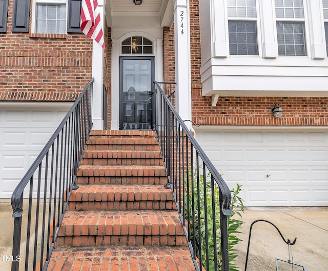 2744 Laurelcherry St, Raleigh, NC 27612 - entrance to property with a garage and brick siding