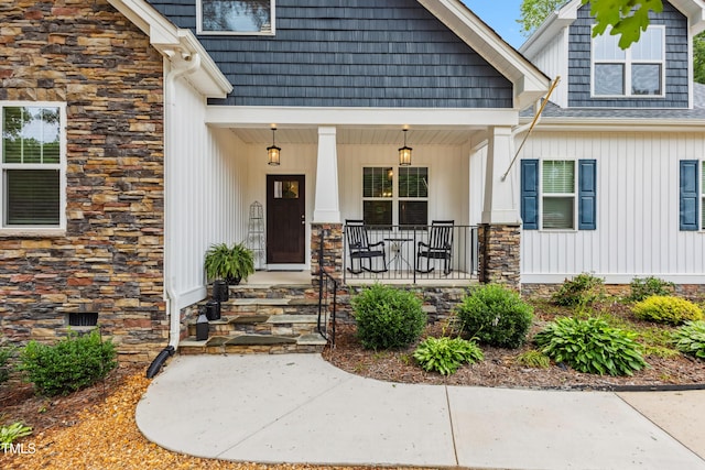 100 Lexington Ave, Zebulon, NC 27597 - entrance to property featuring stone siding and a porch