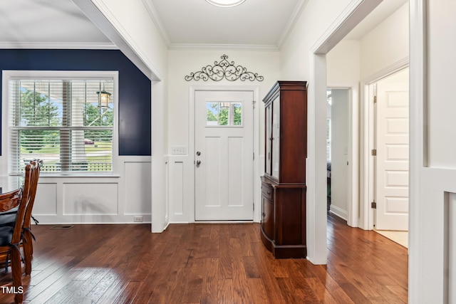 100 Lexington Ave, Zebulon, NC 27597 - foyer with dark wood finished floors, ornamental molding, and wainscoting