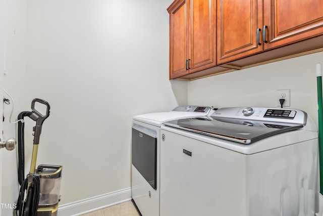 100 Lexington Ave, Zebulon, NC 27597 - laundry room with separate washer and dryer, cabinet space, and baseboards