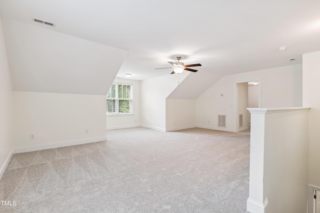 100 Lexington Ave, Zebulon, NC 27597 - additional living space featuring ceiling fan, light colored carpet, lofted ceiling, and baseboards