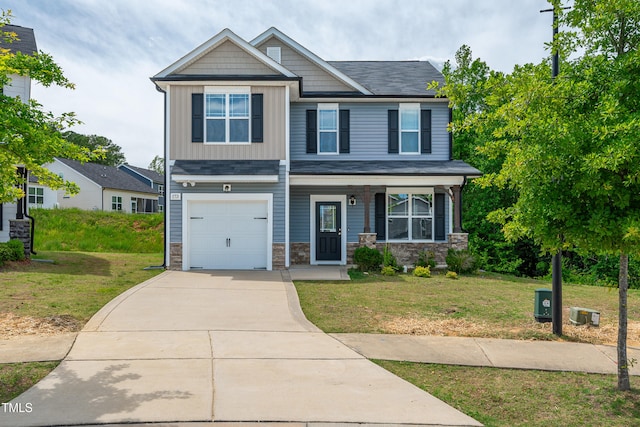 173 Forsyth Pkwy, Clayton, NC 27520 - craftsman-style house with board and batten siding, a front lawn, and stone siding