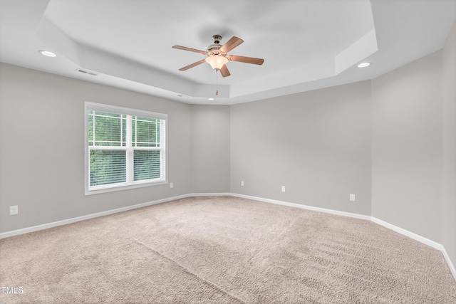 173 Forsyth Pkwy, Clayton, NC 27520 - empty room with recessed lighting, a raised ceiling, ceiling fan, carpet floors, and baseboards