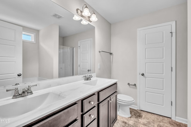 173 Forsyth Pkwy, Clayton, NC 27520 - bathroom featuring double vanity, toilet, baseboards, and a shower