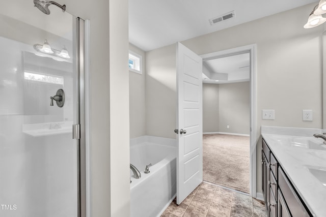 173 Forsyth Pkwy, Clayton, NC 27520 - full bath with a garden tub, double vanity, and a shower stall