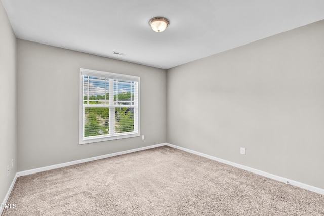 173 Forsyth Pkwy, Clayton, NC 27520 - spare room featuring carpet floors and baseboards