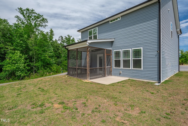 173 Forsyth Pkwy, Clayton, NC 27520 - rear view of property with a sunroom, a patio, and a yard
