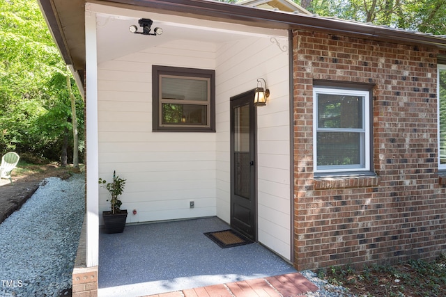 126 Barclay Rd, Chapel Hill, NC 27516 - view of exterior entry featuring brick siding