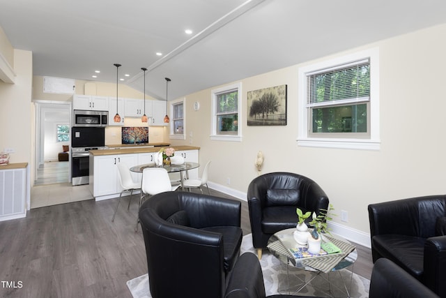 126 Barclay Rd, Chapel Hill, NC 27516 - living area with baseboards, plenty of natural light, dark wood-style floors, lofted ceiling, and recessed lighting