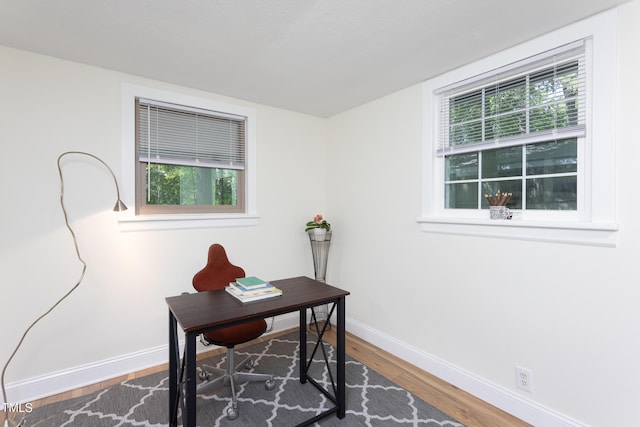 126 Barclay Rd, Chapel Hill, NC 27516 - home office with wood finished floors, plenty of natural light, and baseboards