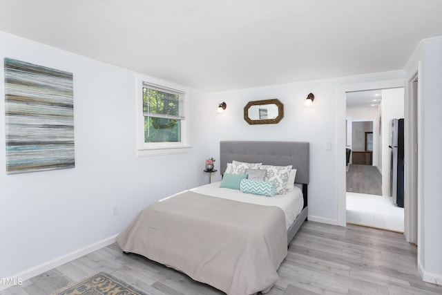126 Barclay Rd, Chapel Hill, NC 27516 - bedroom featuring light wood-type flooring and baseboards